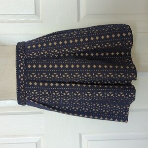 Blue Rain Navy and Tan Geometric Laser Cutout Mini Skirt
